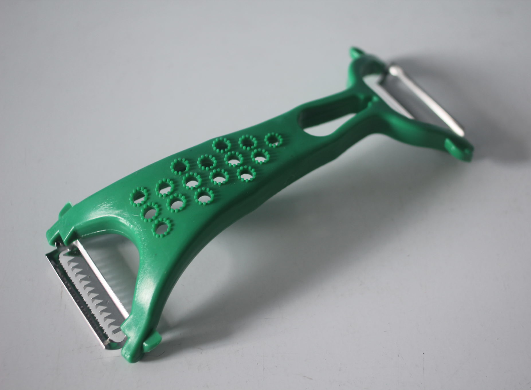 Ніж двосторонній для чистки овочів